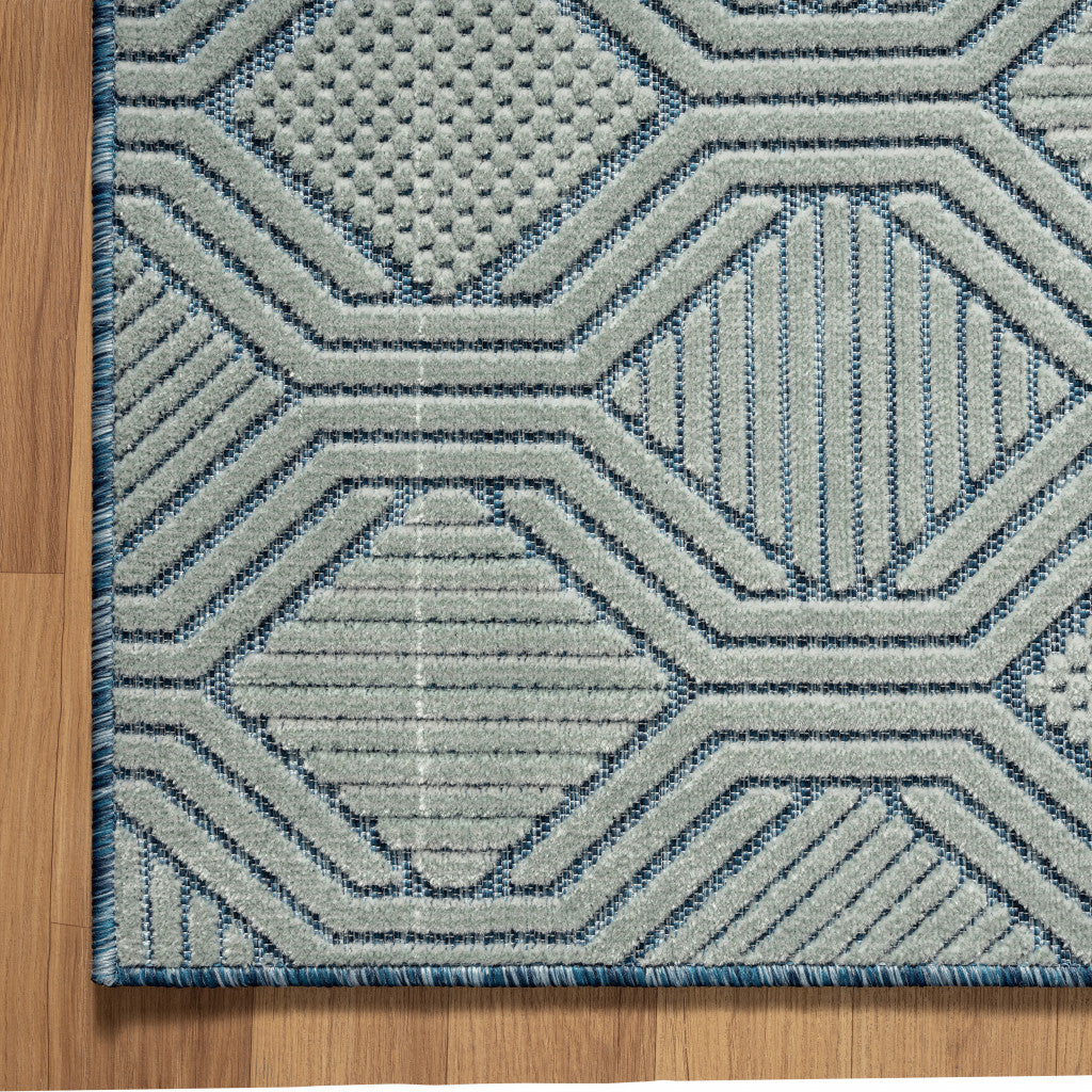 5' X 7' Light Blue And Navy Geometric Stain Resistant Area Rug