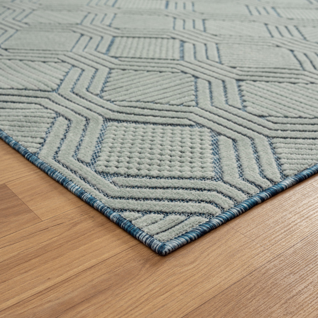 5' X 7' Light Blue And Navy Geometric Stain Resistant Area Rug