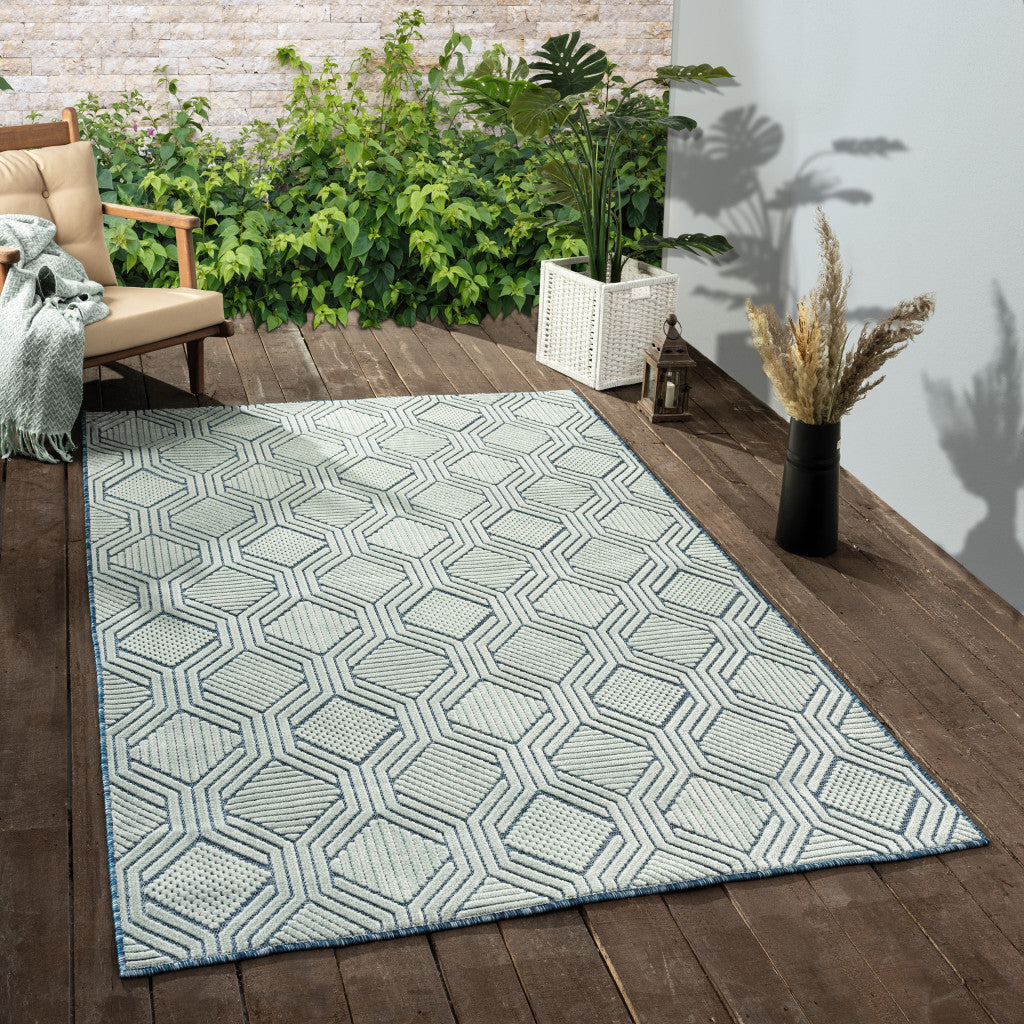 5' X 7' Light Blue And Navy Geometric Stain Resistant Area Rug